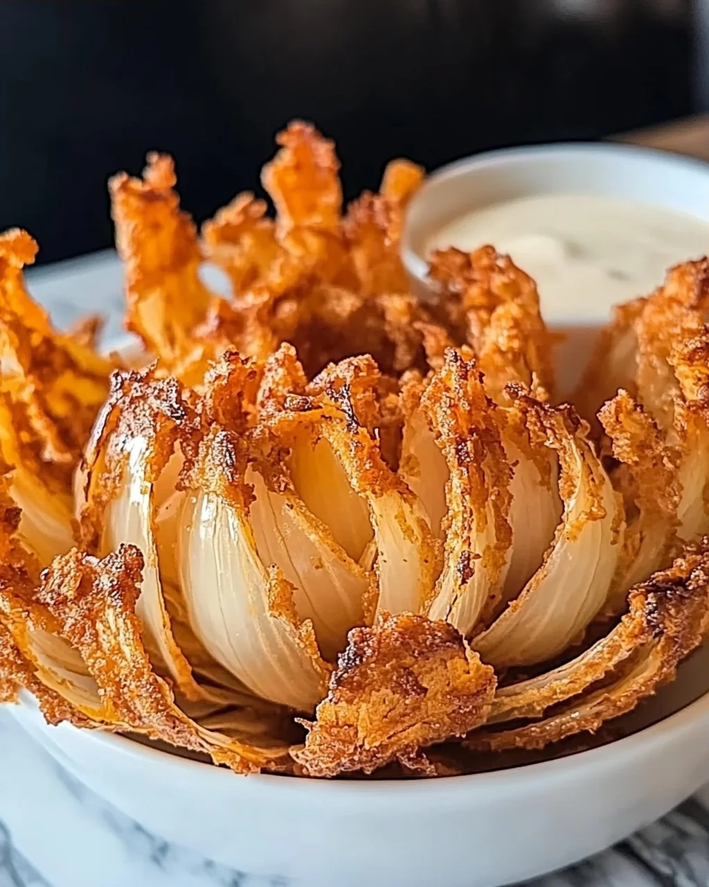 Luftfritteuse blühende Zwiebel: Knuspriger Genuss
